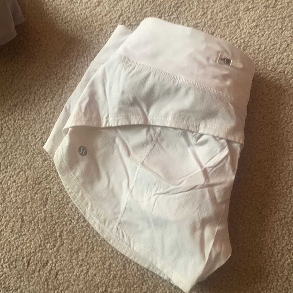 White lululemon shorts. Size 4. tag is ripped.